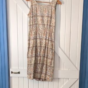 Vintage 1950s cotton dress featuring an Egyptian-themed novelty print